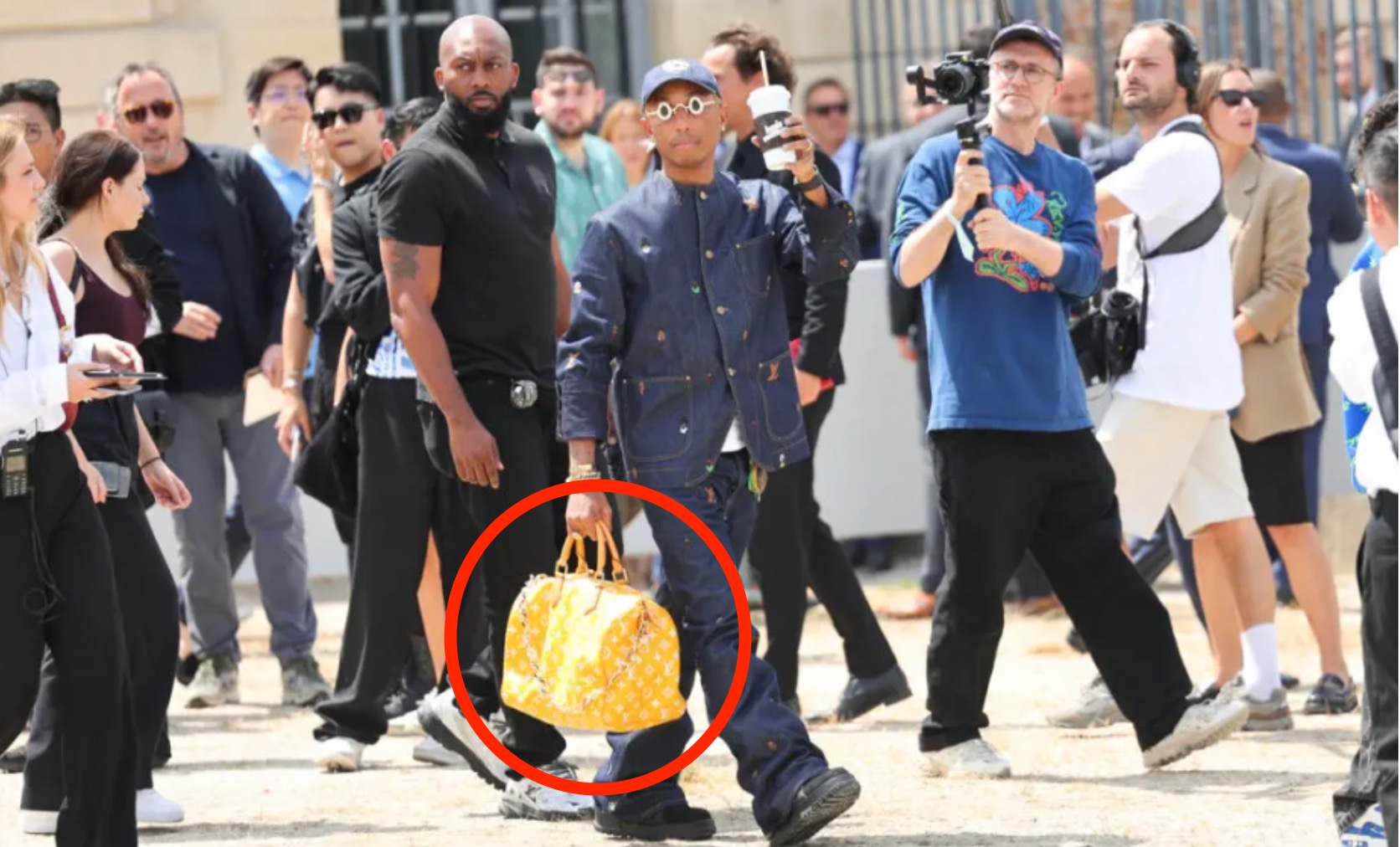 Pharrell Brought a $1M Louis Vuitton Bag to Loewe's Fashion Show – Robb  Report