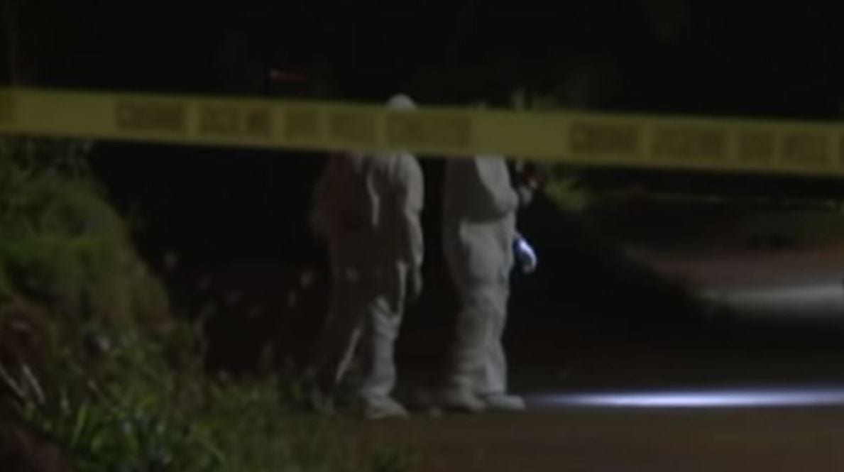 dead yellow tape bush body found killed crime scene