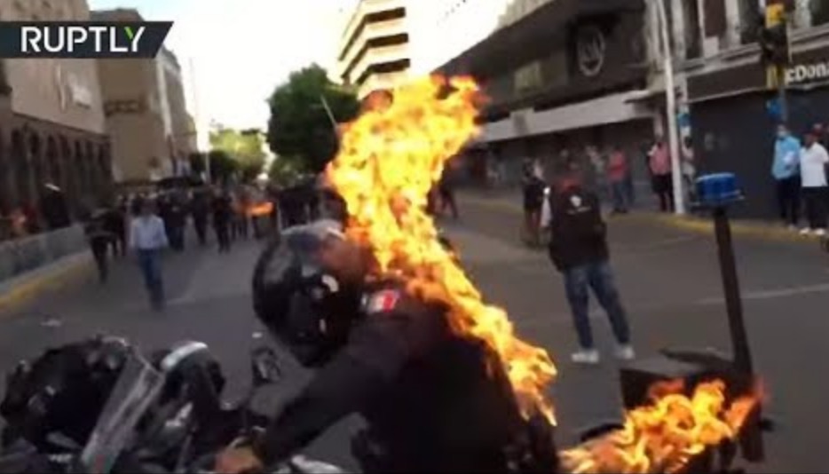 Police Set On Fire by Protester in Mexico [Video]