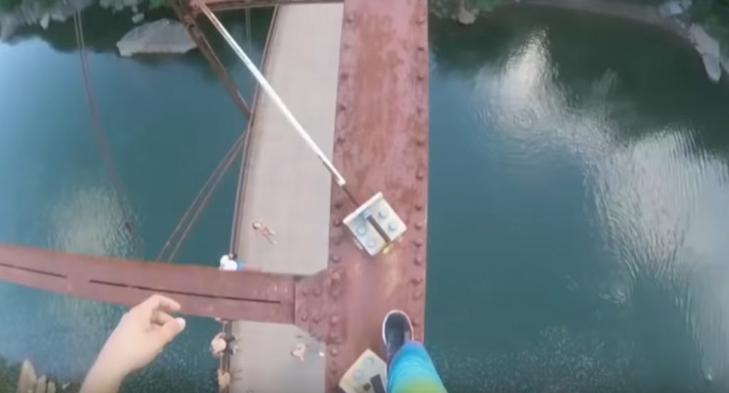 Man jumps off a 105ft Bridge in USA [Video] YARDHYPE