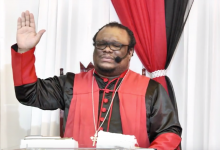 pastor bishop kevin smith praying