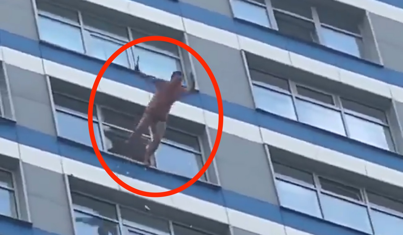 Man Jumping Out Window