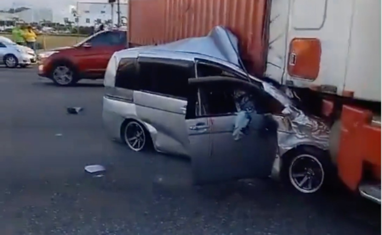 Truck Crushes Car Along Marcus Garvey Drive - Watch Video