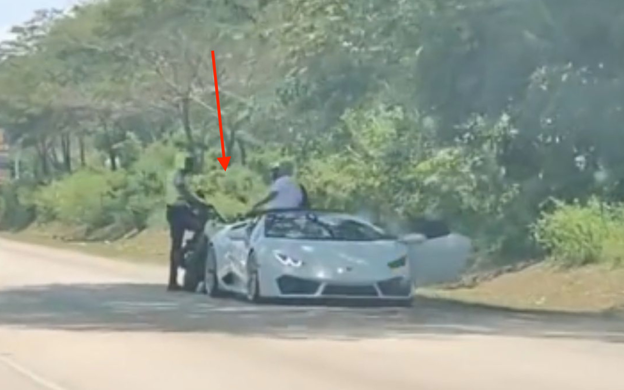 St. Ann Police Officer Reportedly Caught on Camera Collecting Money from Lamborghini Car Driver - Watch Video