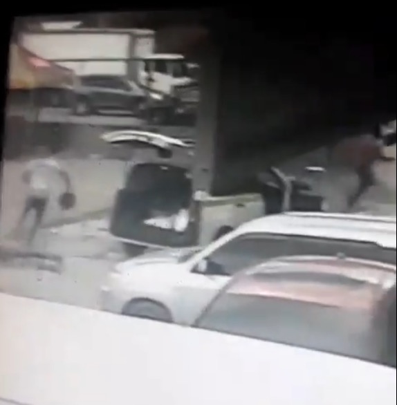 WATCH: Footage Shows Shooting Incident Involving Police, Gunman and Taxi Man in Portmore