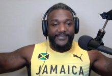 Justin Gatlin Wears Jamaica Jersey Given to Him by Asafa Powell