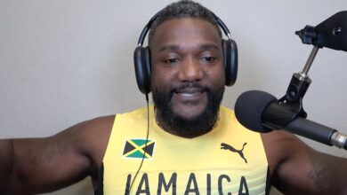 Justin Gatlin Wears Jamaica Jersey Given to Him by Asafa Powell