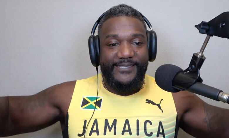 Justin Gatlin Wears Jamaica Jersey Given to Him by Asafa Powell