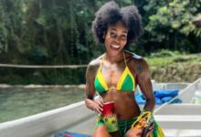 Elaine Thompson-Herah Dons Jamaica Swimsuit at River: Photos