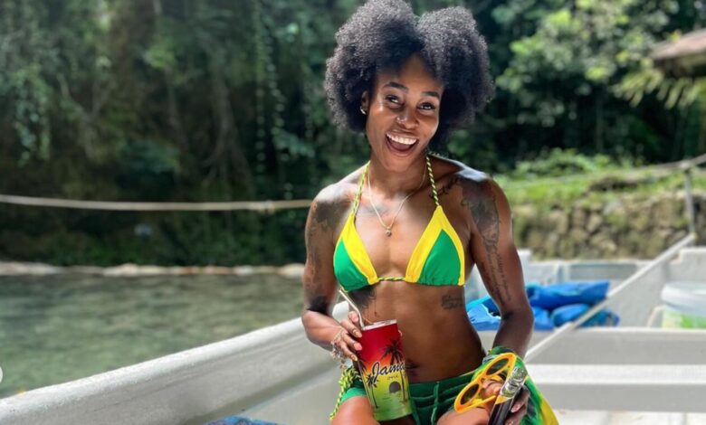 Elaine Thompson-Herah Dons Jamaica Swimsuit at River: Photos