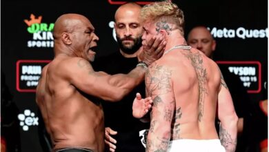 Mike Tyson slaps Jake Paul at their weigh-in Thursday, Nov. 14, 2024 at Irving's Toyota Music Factory on the night before their fight at Arlington's AT&T Stadium. Stephen McCarthy/Sportsfile via Getty Images